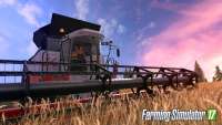 Woman farmer driving a harvester in FS 17